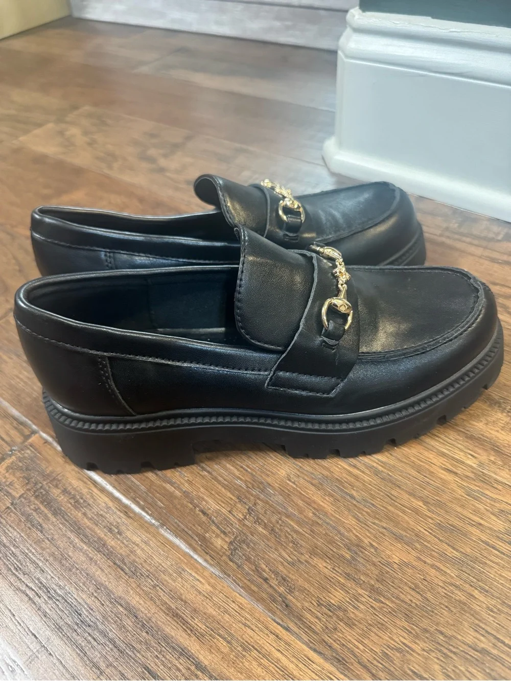 Steve Madden Black Leather Lug-Sole Loafers with Gold Chain